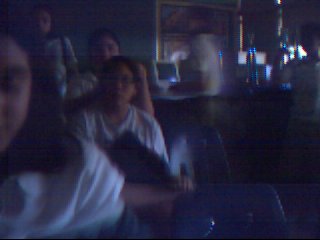 Karisa playing with Stephanie's hair.